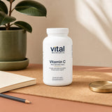 Vital Nutrients C 220 Capsules bottle with white capsules displayed nearby
