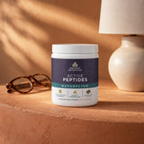 Ancient Nutrition Active Peptides Metabolism Powder Chocolate displayed in a countertop lifestyle setting