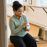 Pure Encapsulations Hawthorn Extract capsules shown beside the bottle