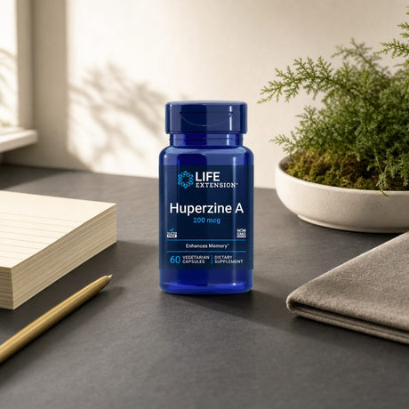 Life Extension Huperzine A 200 mcg bottle displayed with capsules on a clean counter