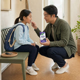 Nature's Way Sambucus Immune Lozenges bottle in a simple wellness routine scene