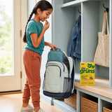Grüns Kids Superfood Greens Gummies pouch with individually wrapped daily packs arranged nearby