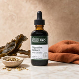Gaia Herbs Pro Digestive Bitters with Turmeric bottle with water glass before a meal