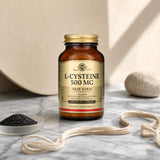 Solgar L-Cysteine 500 mg bottle angled to show side label and amber glass packaging