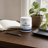 Ancient Nutrition Creatine + Collagen Powder scoop and mixed drink lifestyle scene