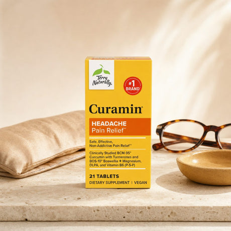 Terry Naturally Curamin Headache Relief box and tablets on a counter