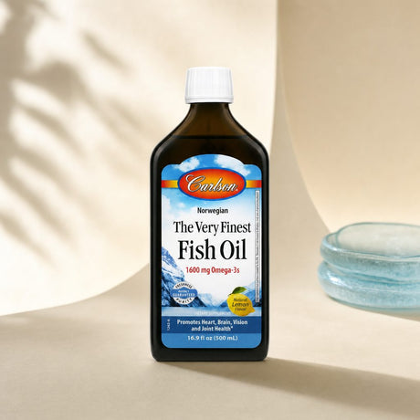 Carlson The Very Finest Fish Oil Lemon bottle with teaspoon for daily omega-3 serving