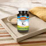 Carlson Vitamin K2 MK-7 180 mcg Softgels bottle with softgels on a clean white background