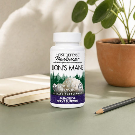Host Defense Lion's Mane 60 Capsules bottle and carton with Lion's Mane mushroom branding