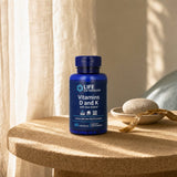 Life Extension D & K with Sea-Iodine bottle beside capsules on a clean counter