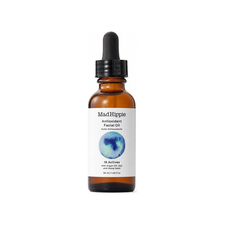Mad Hippie Antioxidant Facial Oil front bottle and box packaging on a pastel background