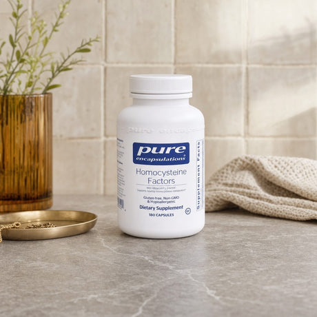 Pure Encapsulations Homocysteine Factors bottle with capsules on a clean white surface