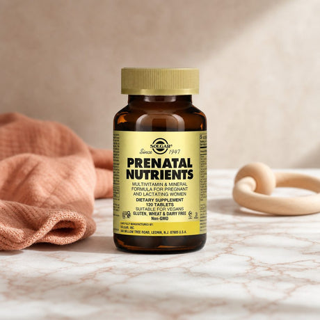 Solgar Prenatal Nutrients Tablets bottle on a clean counter with prenatal essentials