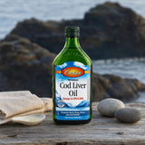Carlson Norwegian Cod Liver Oil Unflavored bottle with spoon showing liquid serving