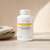 Integrative Therapeutics Panplex 2-Phase 180 tablets bottle on a kitchen counter near a meal