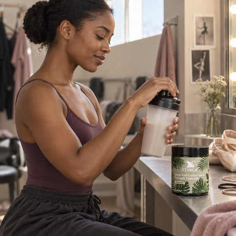 Chuga Grass-Fed Colostrum & Collagen Peptides jar on a dressing-room counter while a woman closes a shaker bottle