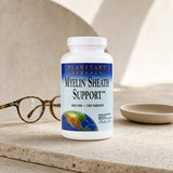 Planetary Herbals Myelin Sheath Support bottle beside a tablet organizer on a countertop
