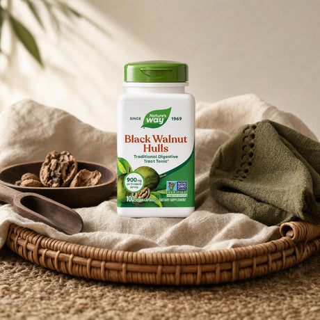 Nature's Way Black Walnut Hulls bottle with capsules on a clean tabletop