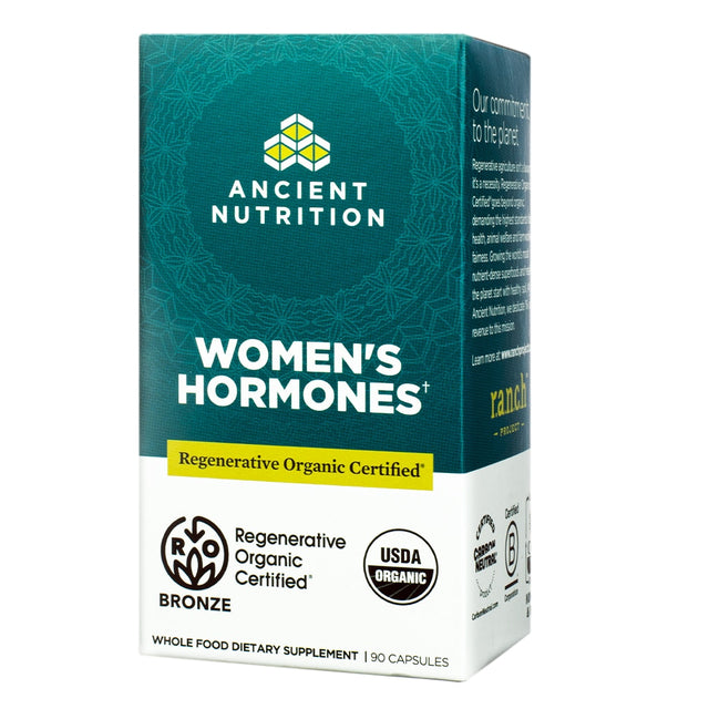 A teal box of Ancient Nutrition's Women's Hormones supplement, offering support for hormonal balance. Features USDA Organic and Regenerative Organic Certified Bronze endorsements, emphasizing whole food dietary supplementation.