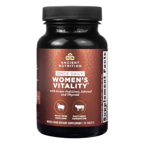 A brown bottle of Ancient Nutrition's Women's Vitality Once Daily supplement, enriched with grass-fed liver, adrenal, and thyroid extracts from New Zealand and Argentina. Designed for women's overall vitality and thyroid health.