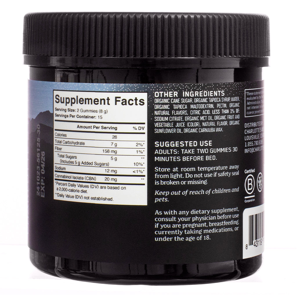 A black jar of Charlotte's Web Stay Asleep Gummies, 30-count, Huckleberry flavor, with a close-up of the supplement facts panel. The label details nutritional information, including 20 mg of CBN per serving, and ingredients such as organic cane sugar and tapioca syrup. Suggested use recommends taking two gummies before bed for sleep support.