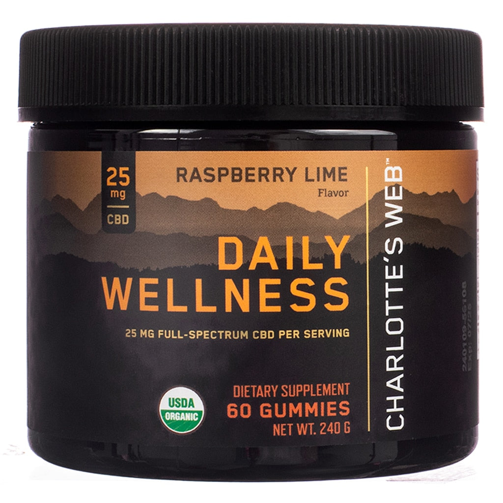 A jar of Charlotte's Web Daily Wellness Gummies, featuring raspberry lime flavor. Each gummy delivers 25 mg of full-spectrum CBD, aimed at promoting overall wellness. USDA Organic certification visible on the label.