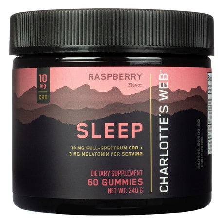 Jar of Charlotte’s Web Sleep Gummies in raspberry flavor, containing 60 gummies. The label features 10 mg of full-spectrum CBD and 3 mg of melatonin per serving, with a pink and black mountain design and “Sleep” prominently displayed. Packaged as a 1-month supply dietary supplement, net weight 240 g.