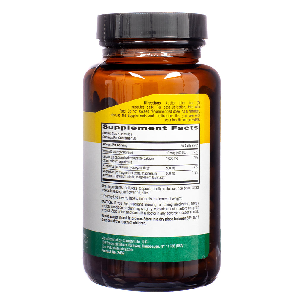 Back label of Country Life Calcium Magnesium with Vitamin D Complex 120 Capsules showing supplement facts for a 4-capsule serving. It details amounts of Vitamin D, calcium, phosphorus, and magnesium, along with a list of other ingredients like rice bran extract and sunflower oil.