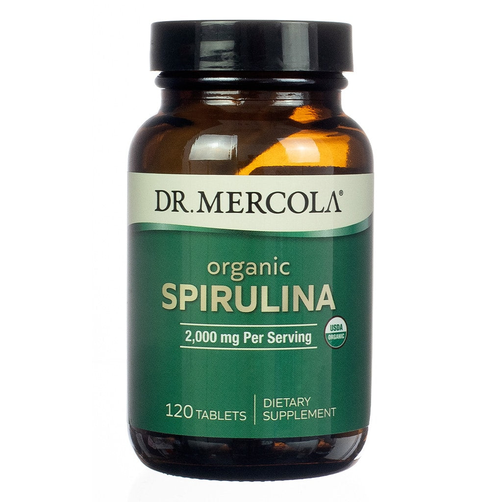 A green-labeled amber bottle of "Dr. Mercola Organic Spirulina," featuring 2,000 mg per serving. USDA Organic-certified, this dietary supplement supports nutritional needs with 120 tablets.