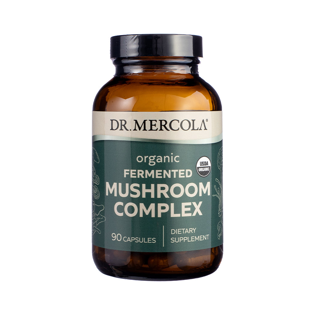 Front view of Dr. Mercola Organic Fermented Mushroom Complex Capsules, 90-count bottle with white label, earth-toned mushroom imagery, and emphasis on adaptogenic and immune support.