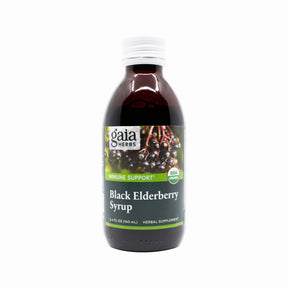 A bottle of Gaia Herbs Black Elderberry Syrup in the 5.4 fl oz size, featuring a green label with images of fresh elderberries and USDA Organic certification. The product supports immune health and comes in a dark amber glass bottle with a white cap.