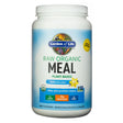 A white container of Garden of Life Raw Organic Meal, a plant-based vanilla-flavored meal replacement shake. The label highlights features like 20g protein, 7g fiber, and 0g sugar, along with USDA Organic and Non-GMO Project Verified certifications.