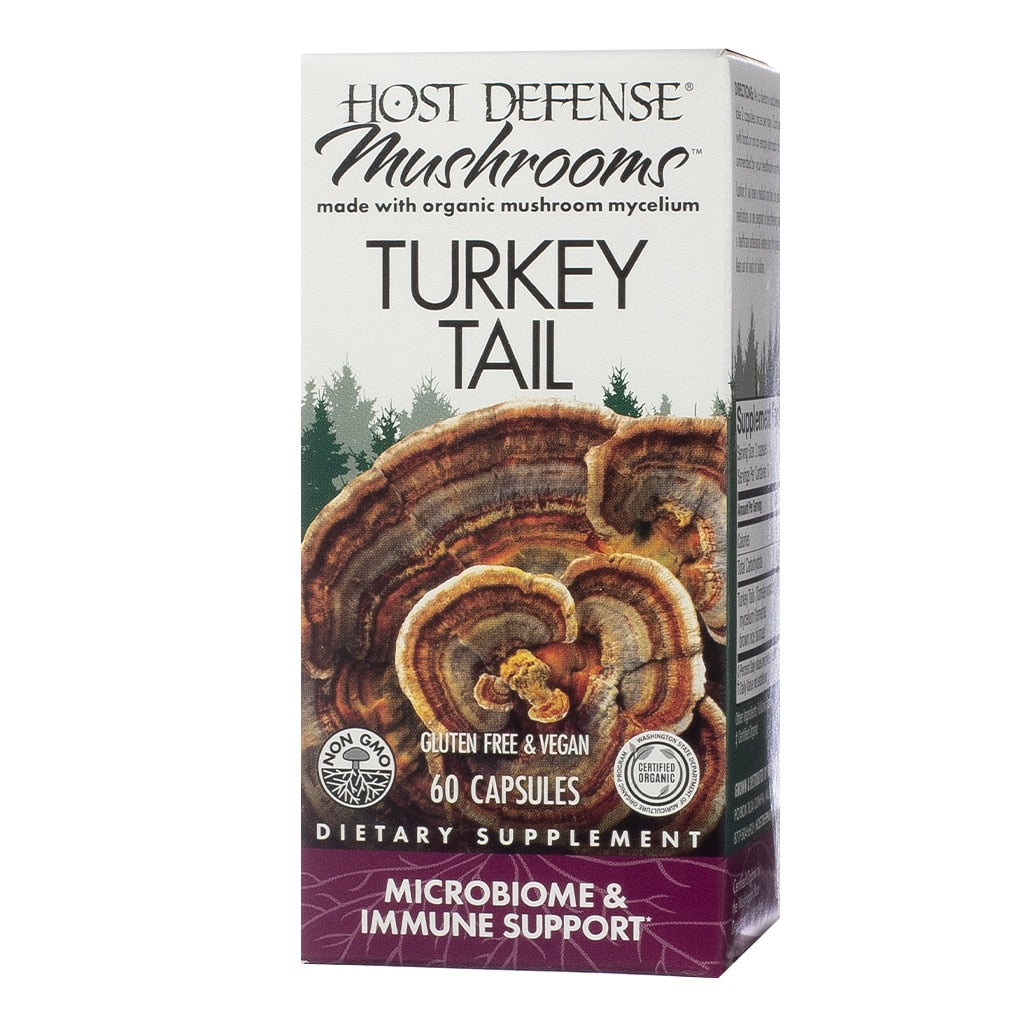 A white rectangular box labeled "Host Defense Mushrooms Turkey Tail," displaying vibrant turkey tail mushrooms with a forest background. This dietary supplement promotes microbiome and immune support, is gluten-free, vegan, and includes 60 capsules made from organic mushroom mycelium.