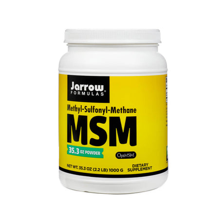 A large white container of Jarrow Formulas MSM (Methyl-Sulfonyl-Methane) powder with a yellow and black label. The front indicates it contains 35.3 ounces (2.2 lbs) or 1000 grams of powder, labeled as a dietary supplement with OptiMSM for purity. Text also highlights it as a 6-month supply.