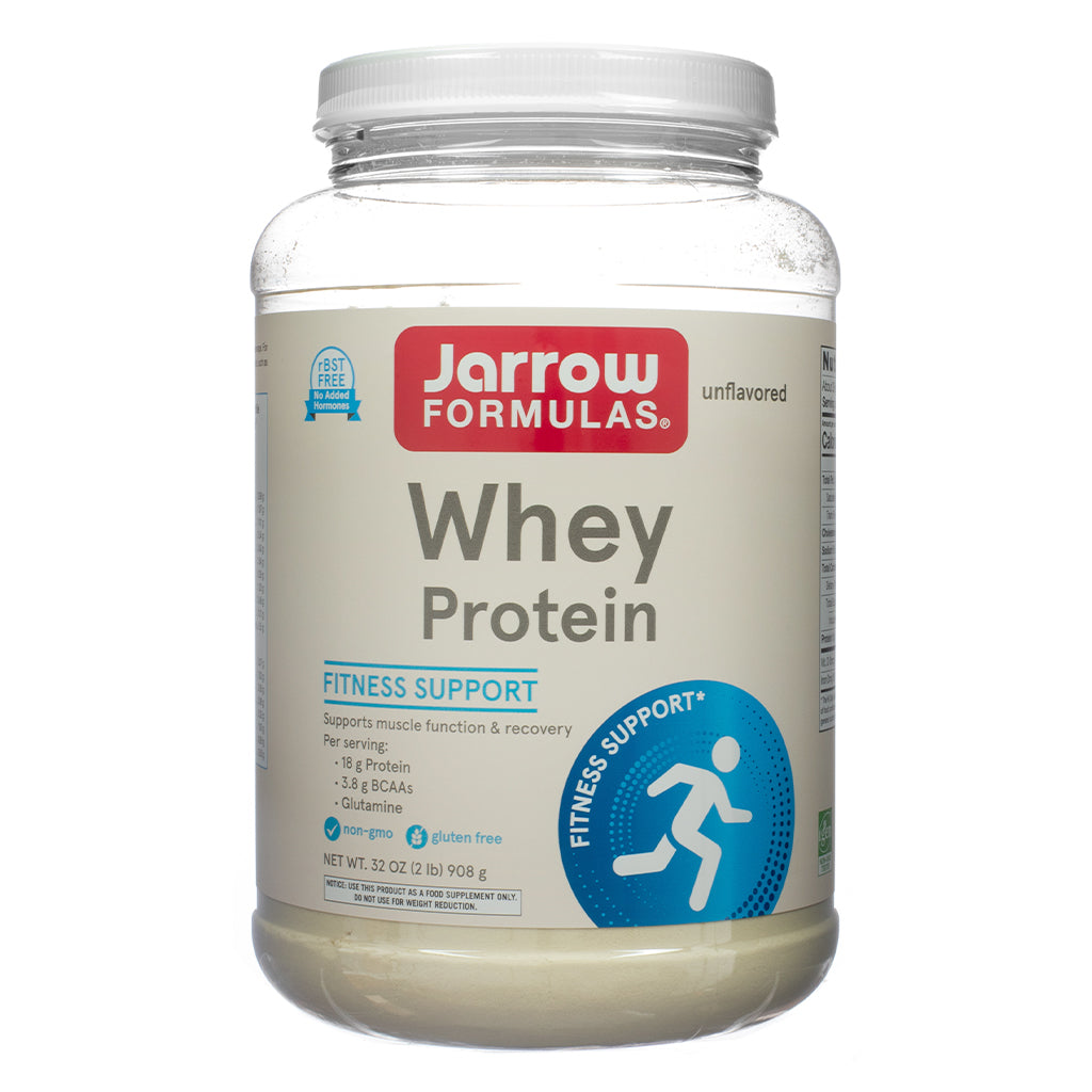Large container of Jarrow Formulas Whey Protein with a clean front label indicating it’s unflavored, supports fitness and recovery, and contains 18g of protein, 3.8g of BCAAs, and glutamine per serving. The label states it's non-GMO, gluten-free, and rBST-free with 32 oz (908 g) net weight.