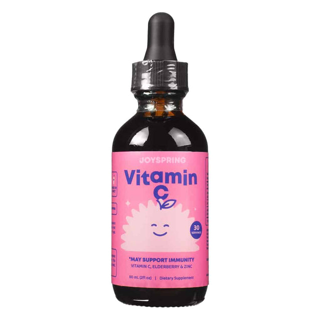 A 2 fl. oz (60 mL) amber glass bottle of JoySpring Vitamin C Drops, with a bright pink label featuring a cheerful leafy character. The supplement provides 30 servings and combines vitamin C, elderberry, and zinc to help support kids’ immune systems.