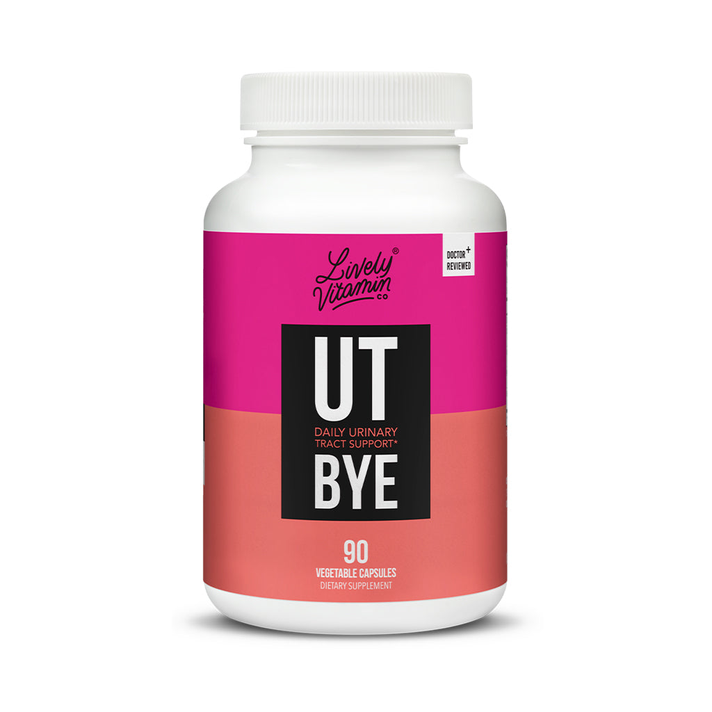 White bottle of Lively Vitamin Co. UT-BYE with a bold pink and coral label, featuring the text “Daily Urinary Tract Support” and “Doctor Reviewed.” Contains 90 vegetable capsules in a dietary supplement formula.