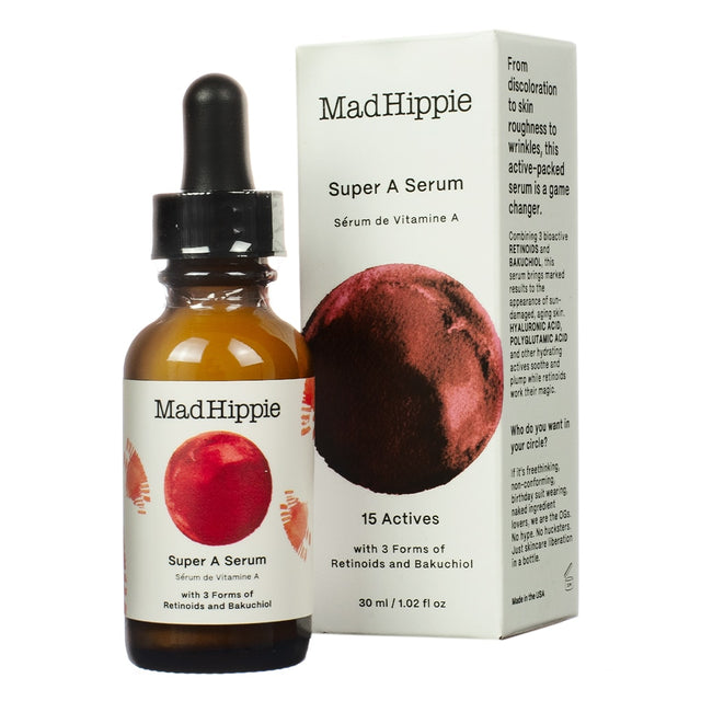 A 30 ml / 1.02 fl oz bottle of Mad Hippie Super A Serum with a dropper, positioned next to its box. The packaging highlights 15 actives, including 3 forms of retinoids and bakuchiol, claiming to address discoloration, wrinkles, and skin roughness for a rejuvenated complexion.