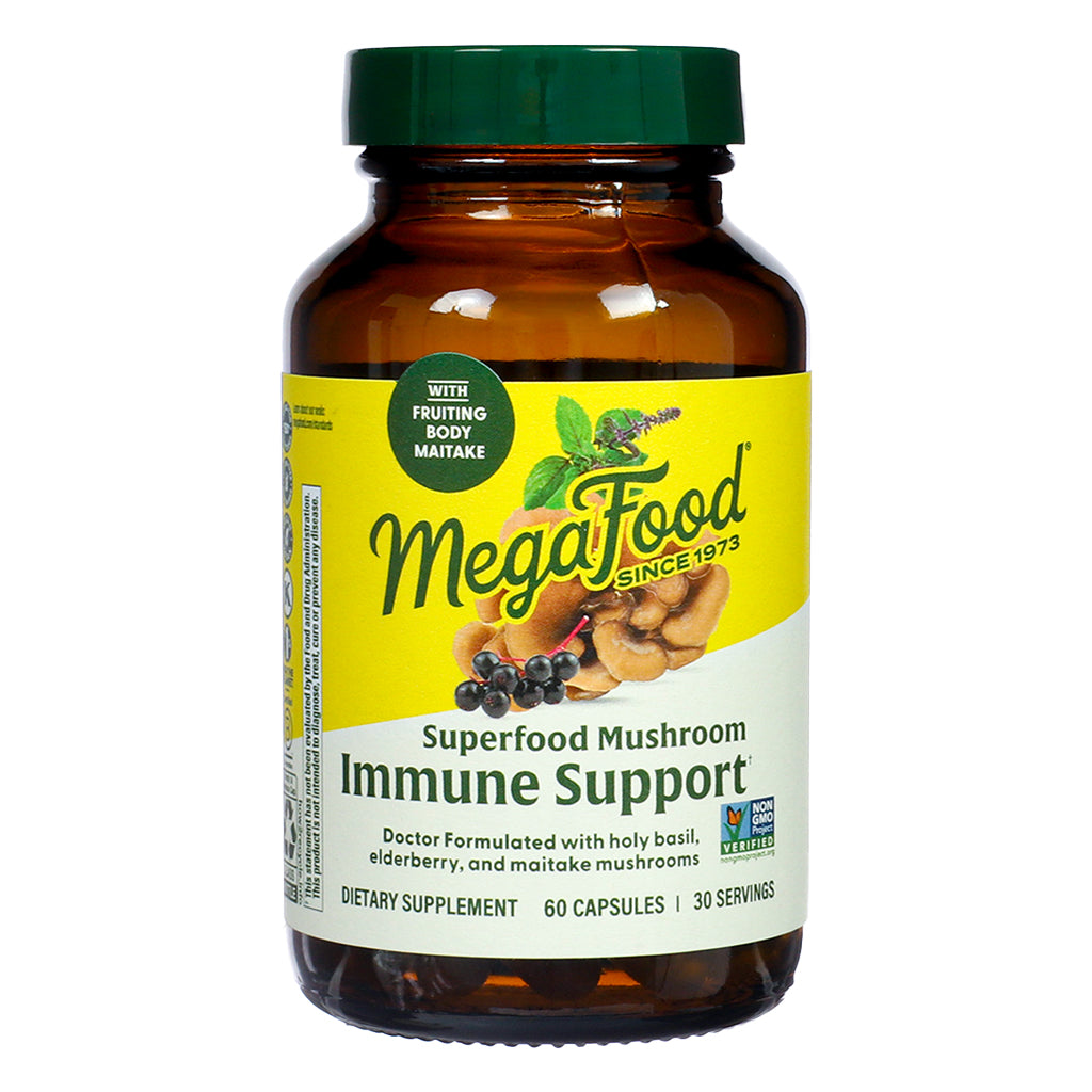 Front label of MegaFood Immune Support, Superfood Mushroom dietary supplement with 60 capsules, featuring holy basil, elderberry, and maitake mushrooms.