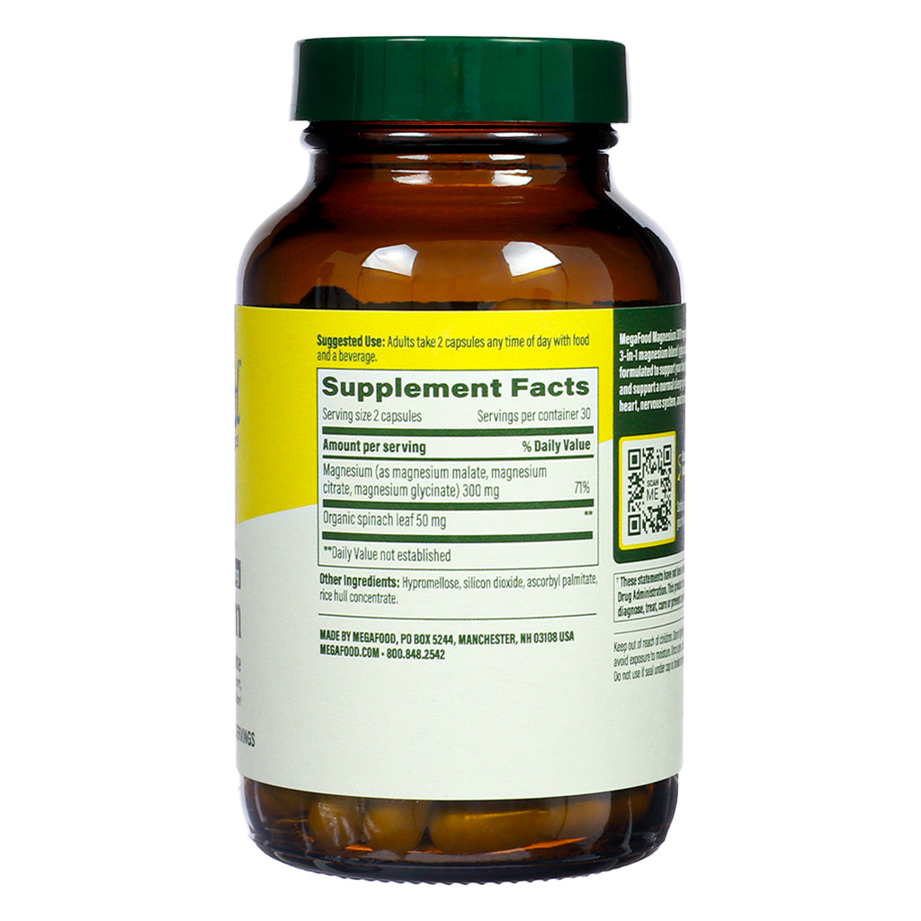Back label of MegaFood Magnesium 300 mg 60 Capsules displaying supplement facts, including magnesium forms and spinach leaf content, along with suggested use and manufacturer information.