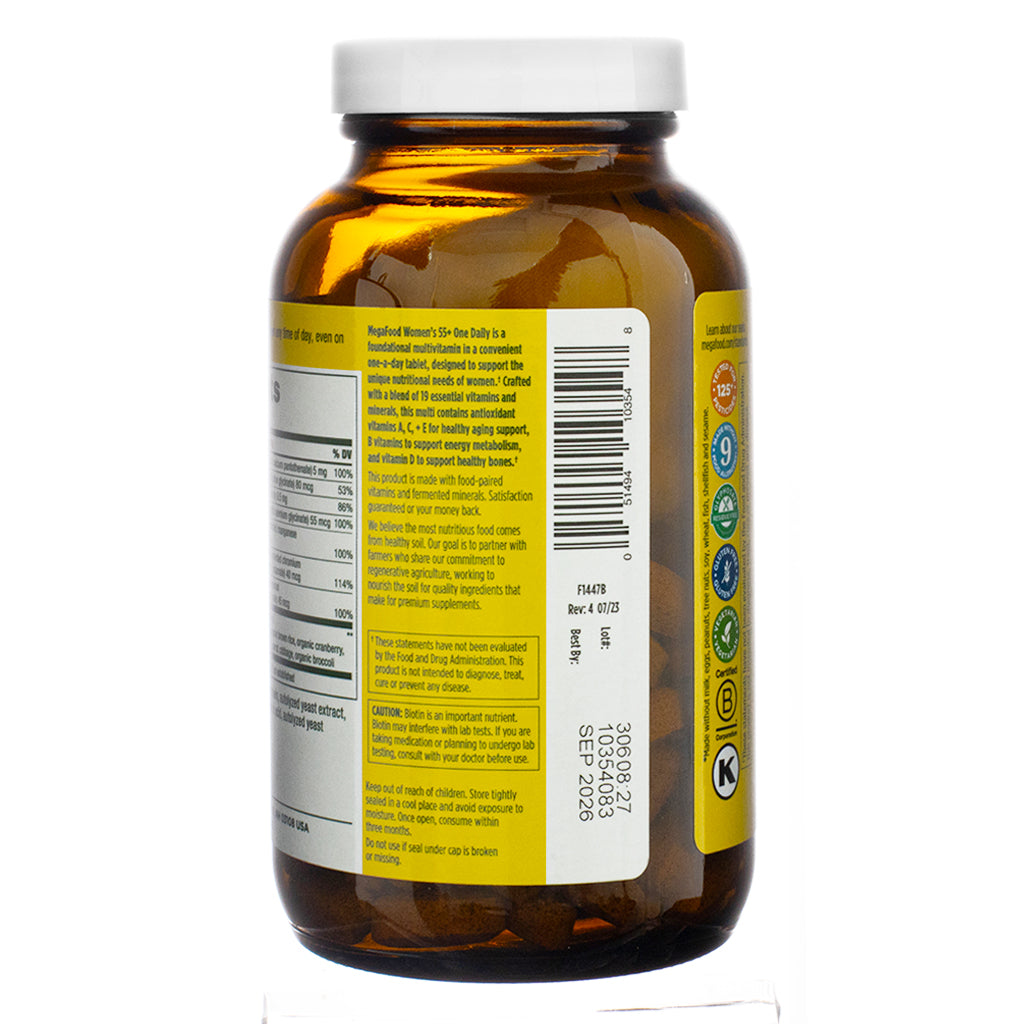 The back label of MegaFood Women's 55+ One Daily Multivitamin, 120 Tablets, highlighting key product benefits. The description emphasizes a blend of 19 essential vitamins and minerals designed to support healthy aging, energy metabolism, and bone health. It also mentions antioxidants such as vitamins A, C, and E and the brand’s commitment to sourcing high-quality ingredients.