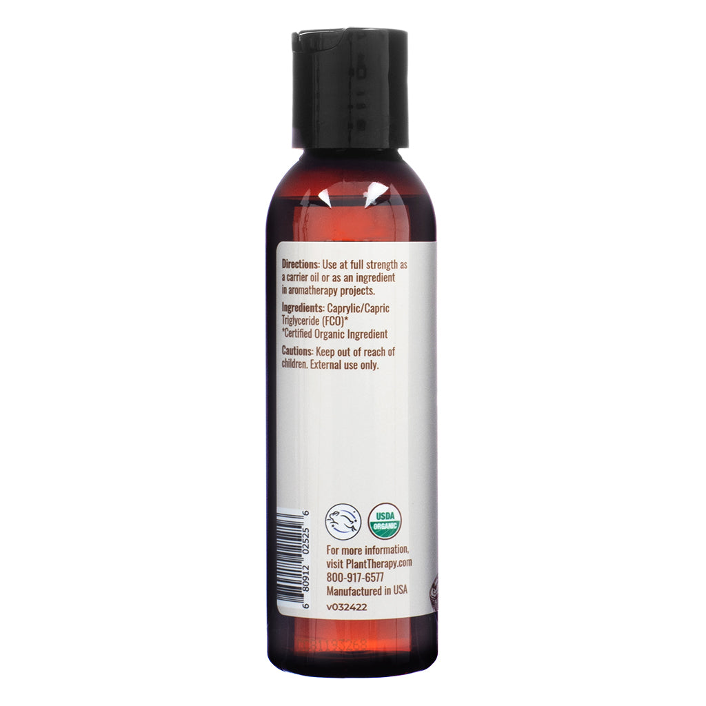 Back of Plant Therapy Organic Fractionated Coconut Carrier Oil 4 fl oz showing directions for use, organic certification, and ingredients listing Caprylic/Capric Triglyceride. The label advises external use only and displays the USDA organic seal.