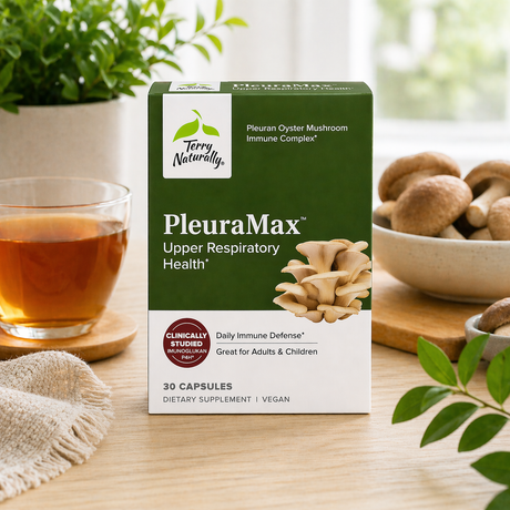 Terry Naturally PleuraMax upper respiratory health supplement box on a kitchen counter with tea, mushrooms, and greenery, highlighting immune support benefits.