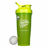 Neon green BlenderBottle with 'Find Your Healthy Place' branding and a genuine product seal on the side. Includes a flip-top spout and a wire whisk ball for mixing drinks or supplements.