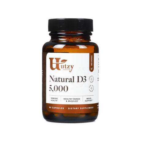 Amber bottle of Utzy Naturals Natural D3 5,000 featuring 60 capsules. The label highlights benefits for immune health, healthy bones and muscles, and mood support.