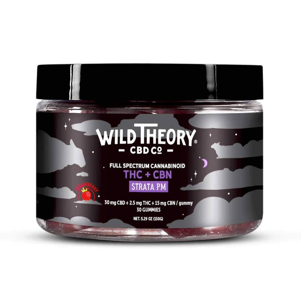 A small, squat jar of Wild Theory CBD Co Strata PM THC + CBN gummies in strawberry flavor. The label reads "Full Spectrum Cannabinoid" and features a dreamy black-and-gray night sky with 30 mg CBD, 2.5 mg THC, and 15 mg CBN per gummy; contains 30 gummies.