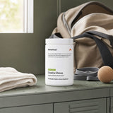 Momentous Creatine Chews jar with chewable tablets shown beside the container
