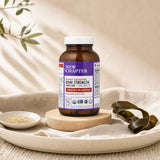 New Chapter Bone Strength Take Care bottle with slim tablets and plant calcium callouts