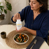 Integrative Therapeutics Panplex 2-Phase 180 tablets beside a glass of water at mealtime
