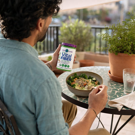 Vital Planet Organic Vital Fiber powder served with breakfast foods and a drink